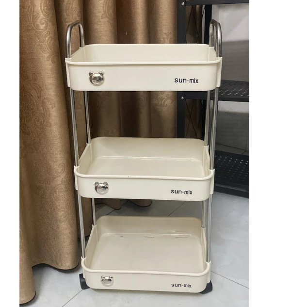 Ảnh sản phẩm do Shopee hiển thị, kiểm tra ngày 8/8/26 Kệ đựng đồ đa năng 3 tầng Sunmix khay nhựa cao cấp , kệ đựng đồ nhà bếp có bánh xe di chuyển (Loại To) đang được đối chiếu cho người mua tại Việt Nam